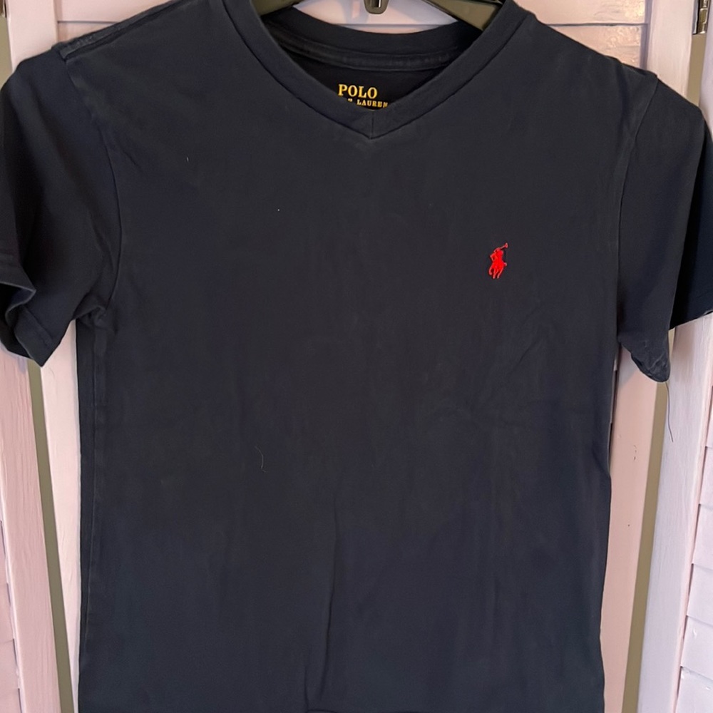 Polo by Ralph Lauren.  Very dark blue with red pony for boys